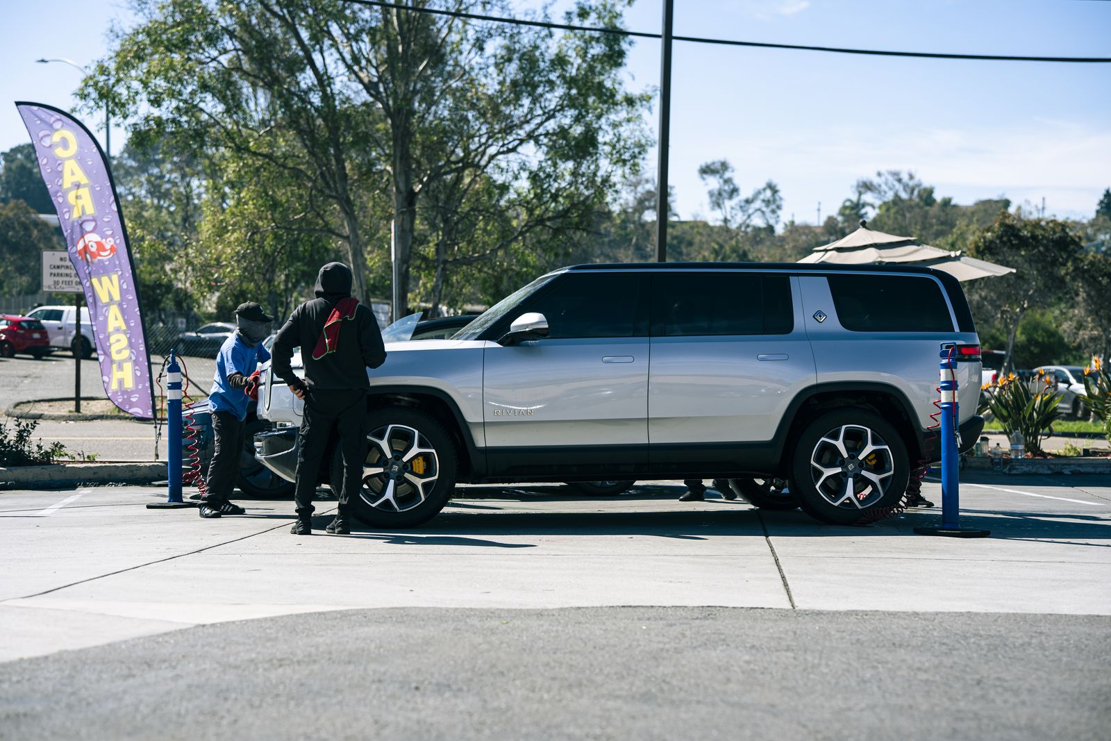 A Rivian in the Cardiff Car Wash lot